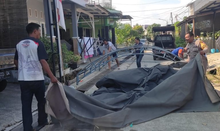 Gotong royong Bersama warga binaan, Bhabinkamtibmas Bontang Utara Gelar Cooling System Menjelang Pilkada 2024