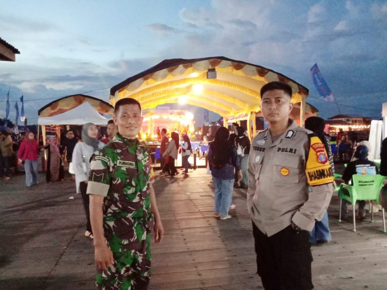 Bhabinkamtibmas Bontang Kuala Laksanakan Pengamanan Adat Pesta Laut