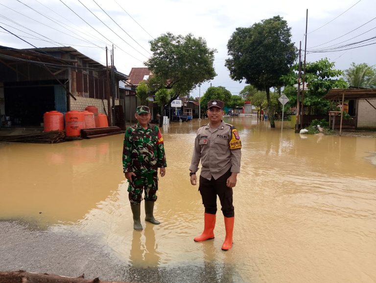 *Antisupasi Luapan Air Sunga,  Bhabinkamtibmas Gunung Elai Lakukan Monitoring banjir diwilayah binaan*